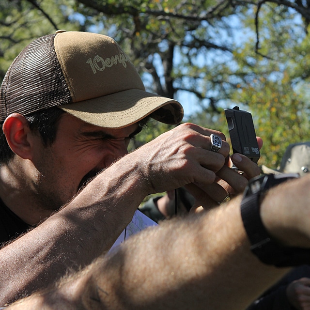 Man working on land navigation.