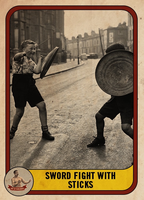 Vintage boys sword fighting with sticks in the street.