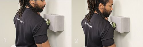  Vintage man using a yoga block to apply more pressure block.