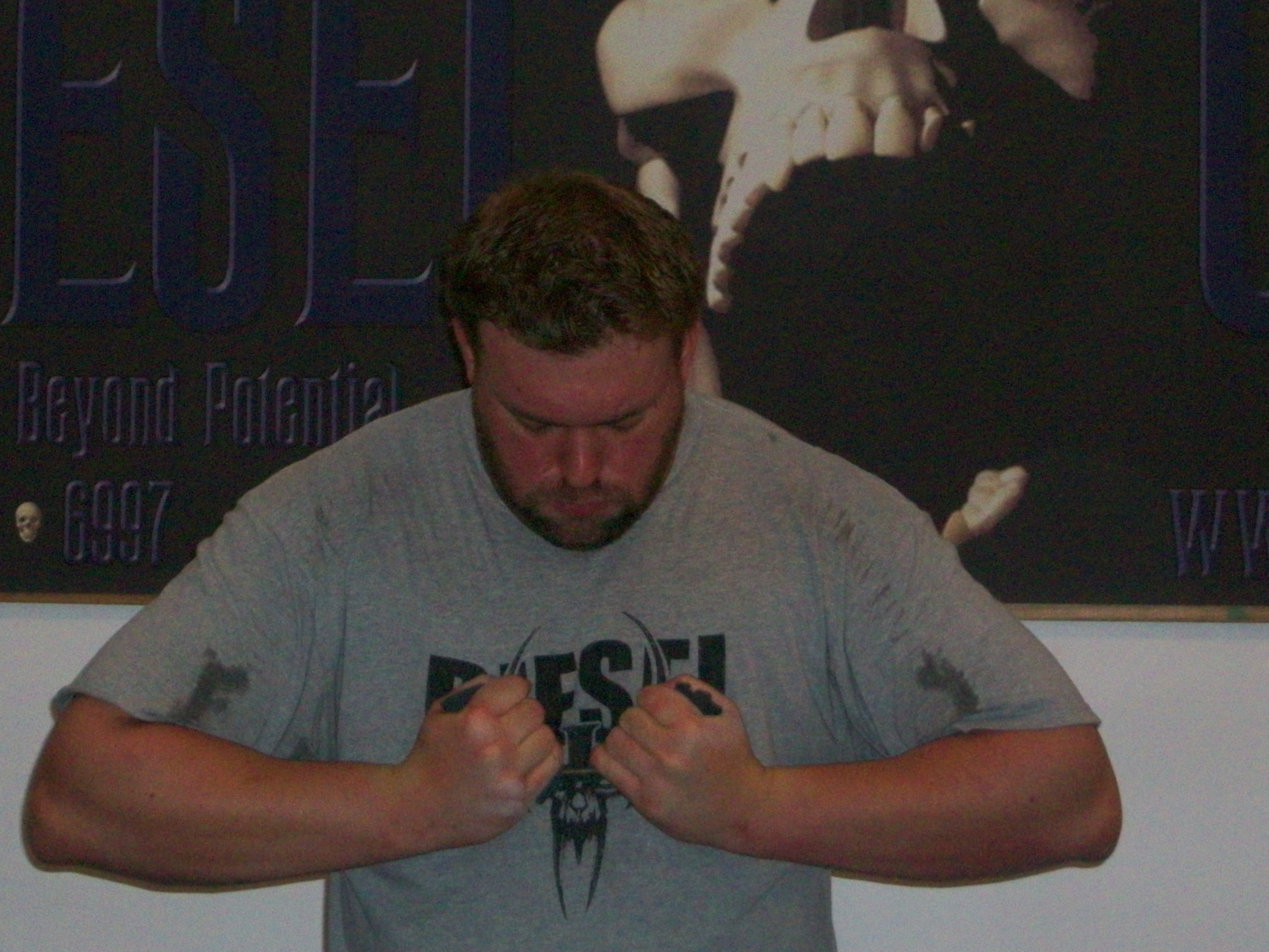 Man doing exercise of underhand bending.