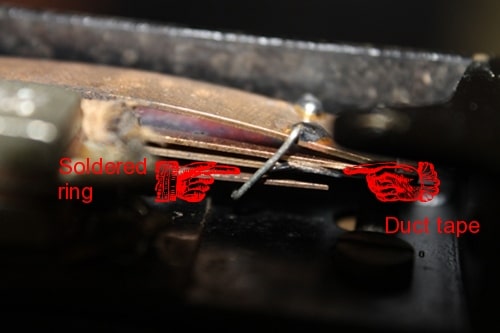 Vintage putting a piece of duct tape between the plates and soldered a ring contact around them.