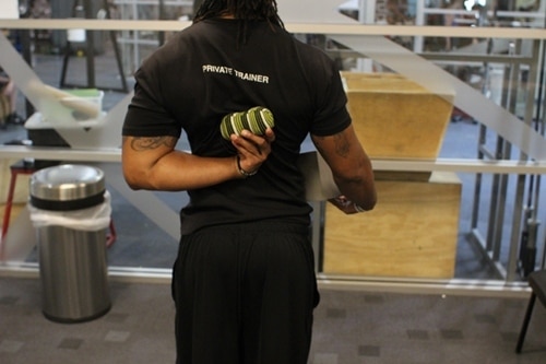 Vintage foam roller exercises for middle back.