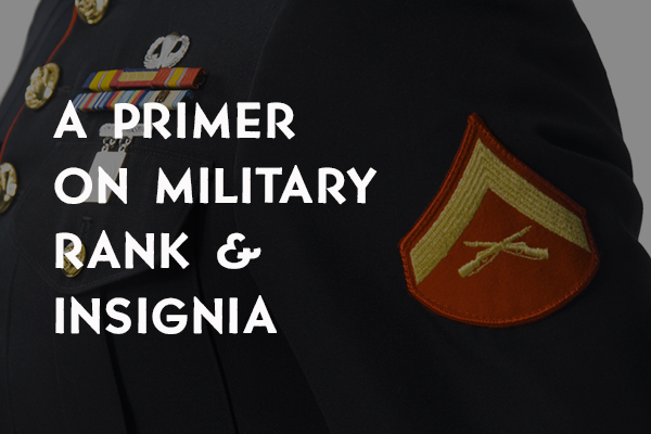 A close up of a military uniform with insignia.