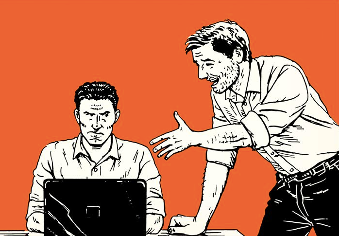 Two coworkers are discussing a deal on a laptop.